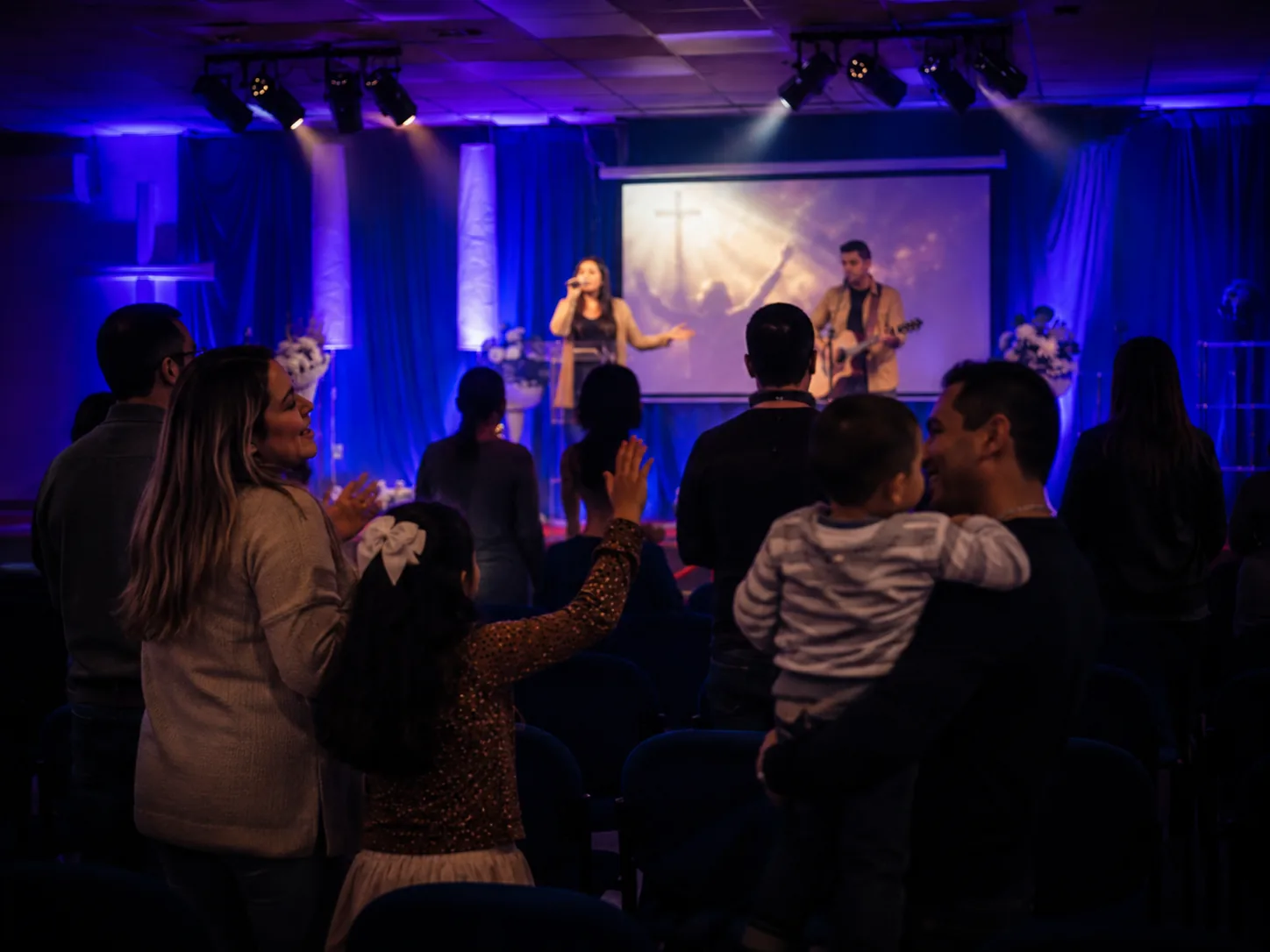 Families worshipping together at Global Miracle Healing Church